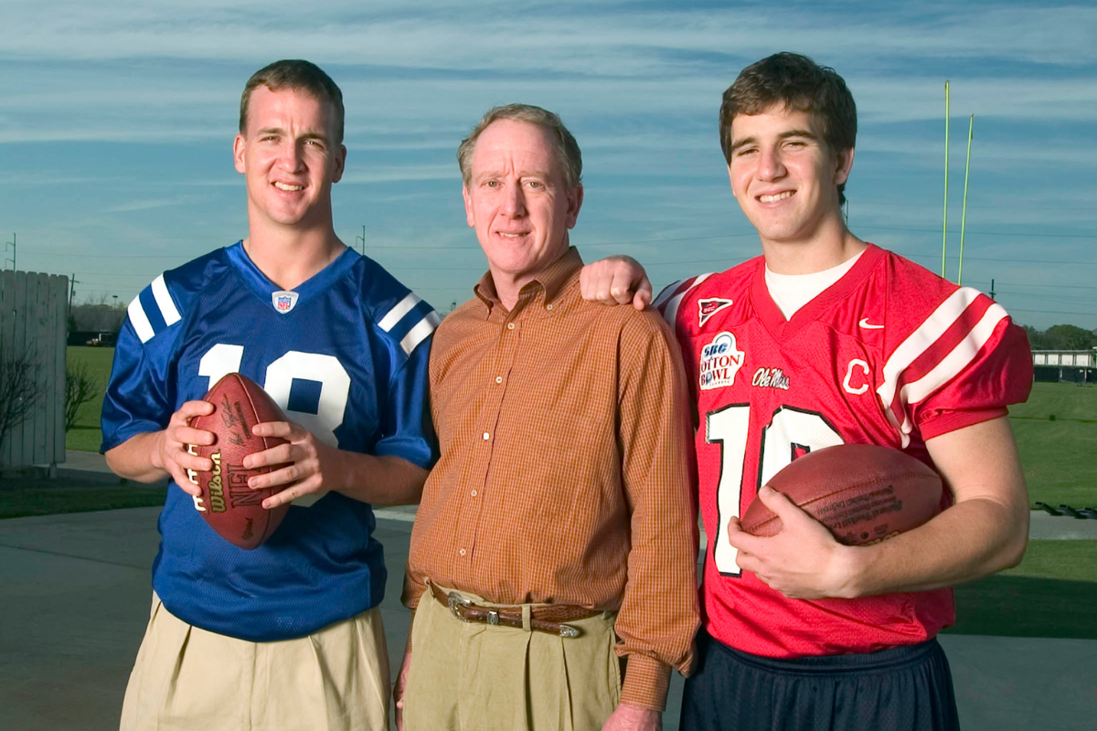 Peyton, Archie and Eli Manning pose during a photoshoot during their rise to NFL glory.