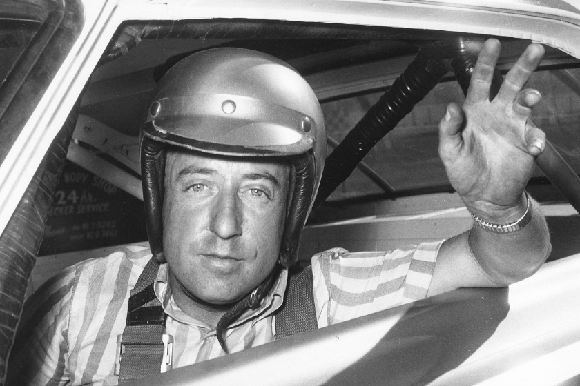 Rex White poses in his car in 1960