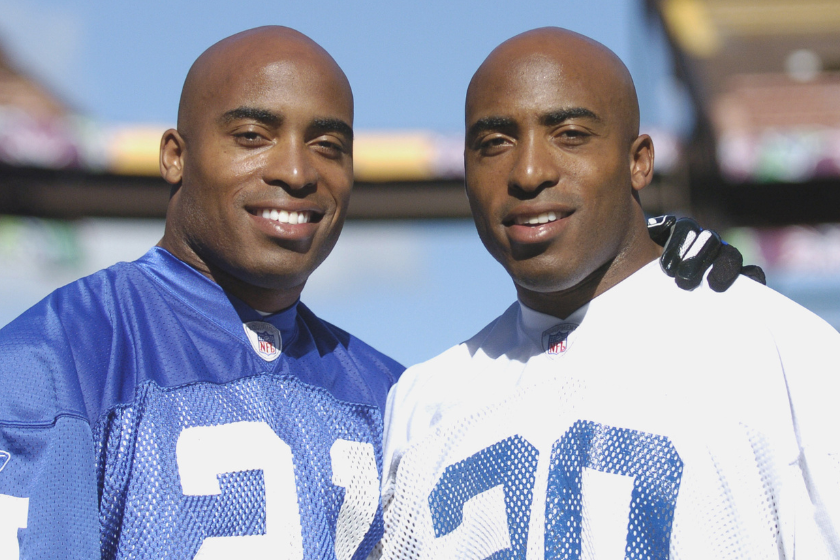 Tiki (left) Barber, a New York Giants running back, and Ronde (right) Barber, a Tampa Bay Buccaneers defensive back, participate in an NFC squad practice for the 2005 Pro Bowl