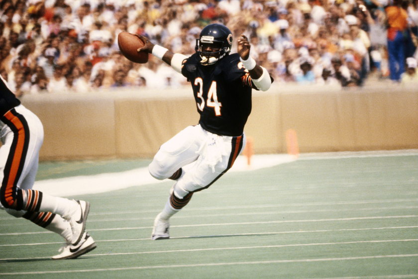 Walter Payton runs during an NFL game in 1983.