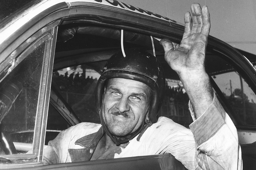 Wendell Scott waves from his car at Jacksonville Speedway in 1963