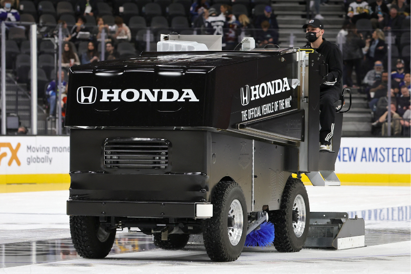 Chris Cotsilis drives a Zamboni during the 2022 NHL All-Star Game.
