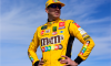 Kyle Busch stands on the grid prior to the Monster Energy NASCAR Cup Series Hollywood Casino 400 at Kansas Speedway on October 20, 2019 in Kansas City, Kansas