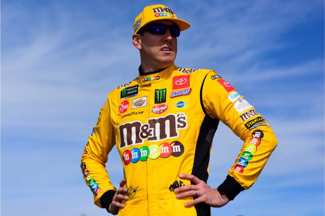 Kyle Busch stands on the grid prior to the Monster Energy NASCAR Cup Series Hollywood Casino 400 at Kansas Speedway on October 20, 2019 in Kansas City, Kansas