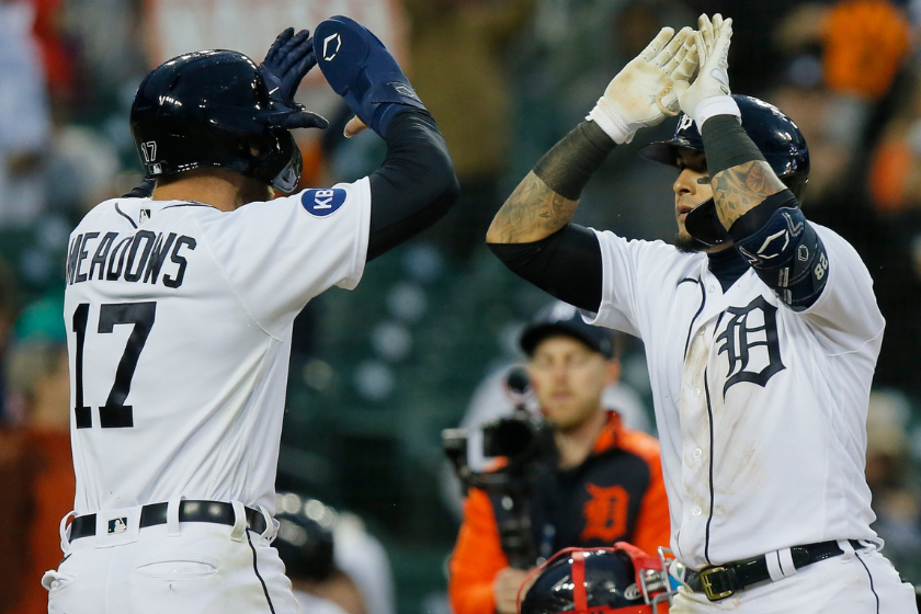 Austin Meadows congratulates Javy Baez after hitting a home run for the Tigers