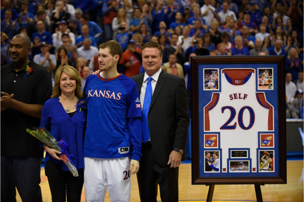 Bill Self and his wife Cindy celebrating KU senior night with their son Tyler.