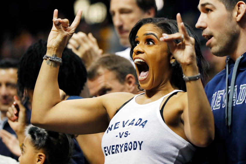 Danyelle Sargent, wife of head coach Eric Musselman · cheers on the Nevada Wolf Pack against the Loyola Ramblers in the first half during the 2018 NCAA Men's Basketball Tournament South Regional at Philips Arena