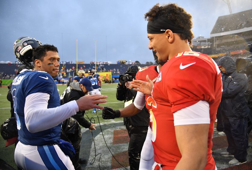 Patrick Mahomes and Russell Wilson high five at the 2019 Pro Bowl.