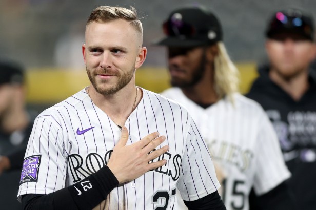 Trevor Story acknowledges the crowd at his final home gam as a Colorado Rockie.