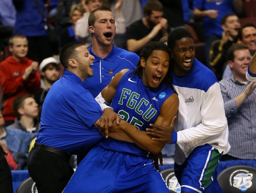 FGCU players react during a 2013 NCAA Tournament game.