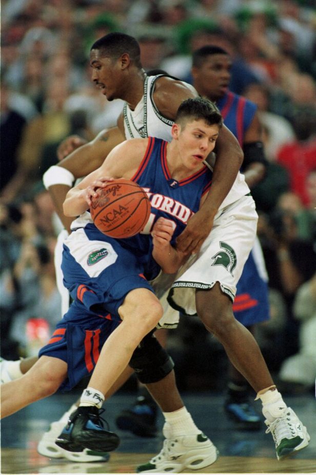 Mike Miller dribbles during the 2000 NCAA Tournament.