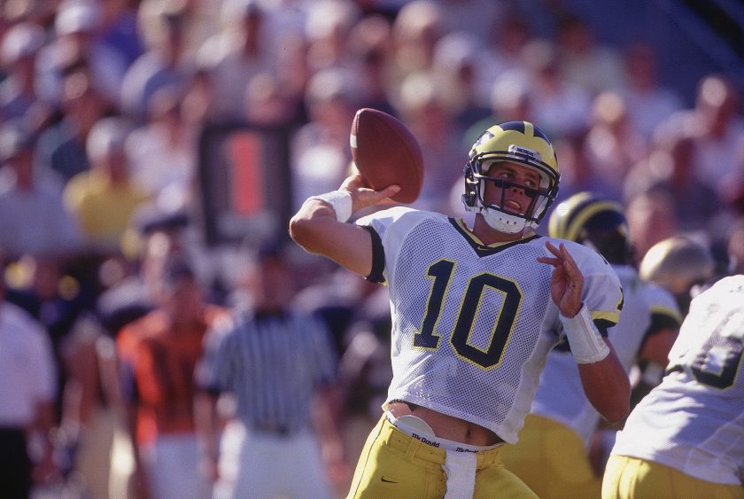 Tom Brady plays for Michigan in 1998.