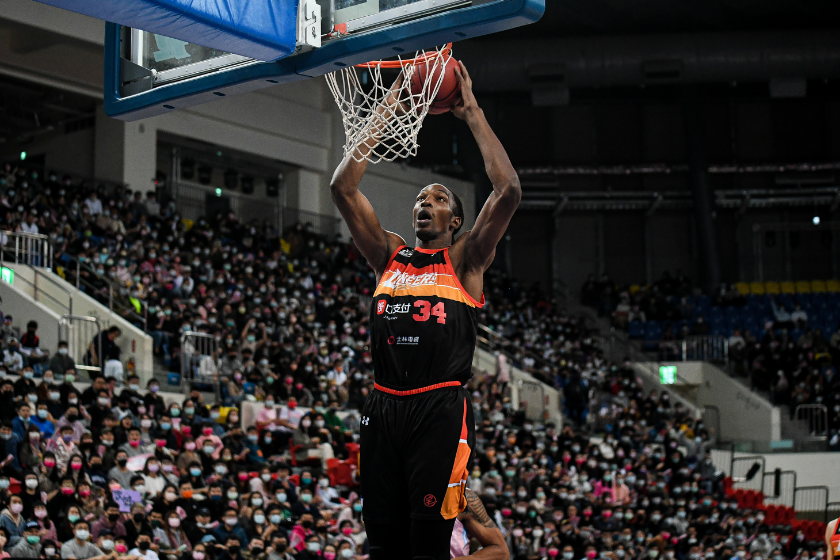 Hasheem Thabeet dunks in a Tawainese basketball game.