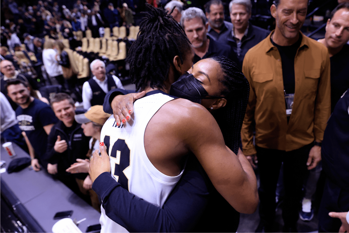 Jaden Ivey and his mom embrace after Purdue beat Rutgers in February 2022.