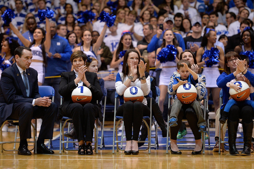 Mike Krzyzewski and his family celebrate his 1,000th career win at Cameron Indoor Stadium.