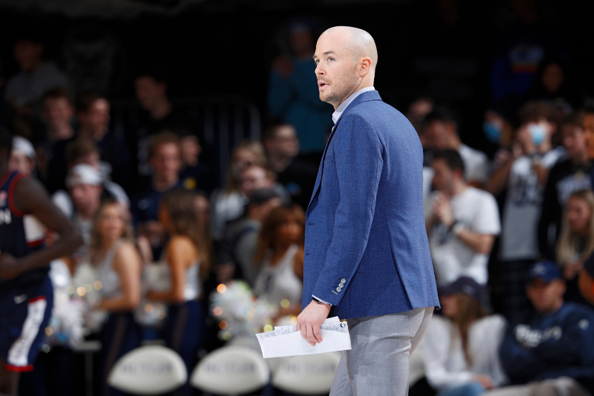 UConn assistant coach Luke Murray paces the sidelines against Butler.
