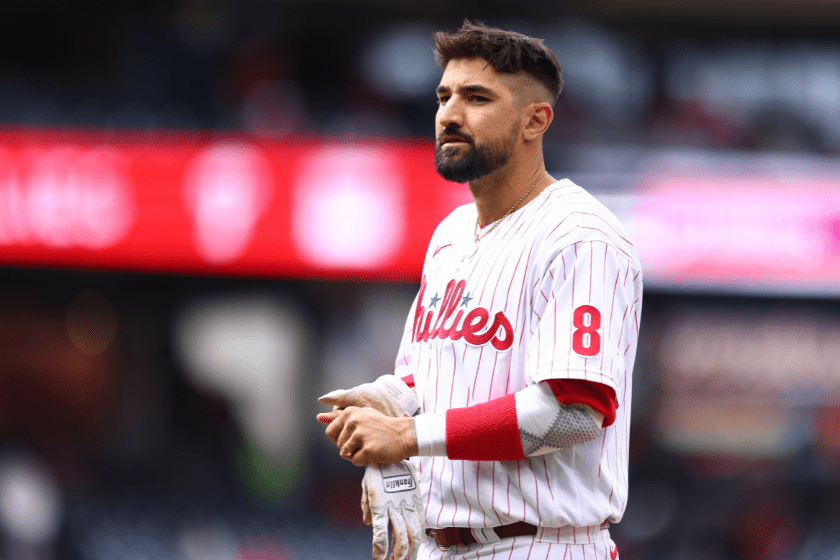 Nick Castellanos looks into the Phillies dugout in between innings.