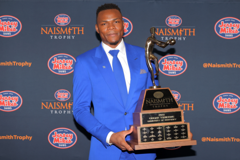 Oscar Tshiebwe of the Kentucky Wildcats poses with the 2022 Jersey Mike's Naismith Men's College Player of the Year trophy during the 2022 Naismith Awards Brunch