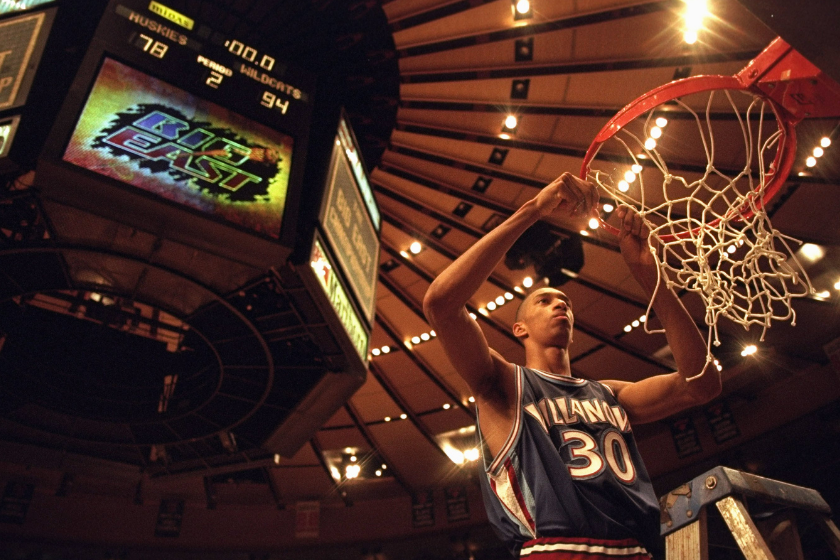 Kerry Kittles cuts down the nets after winning the Big East tournament with Villanova.