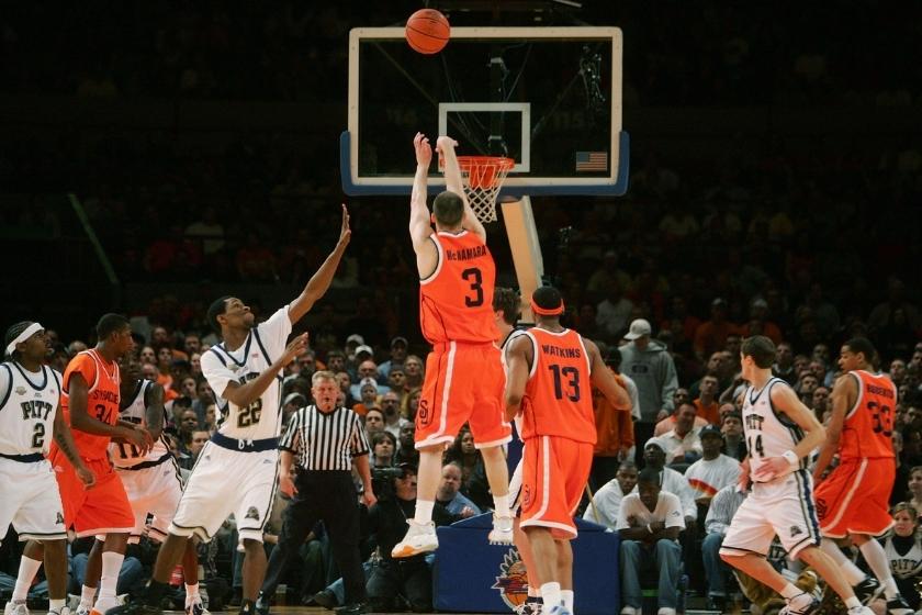 Gerry McNamara #3 of the Syracuse Orange shoots a three-pointer against the Pittsburgh Panthers