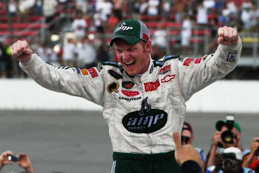 Dale Earnhardt, Jr. celebrates with his crew in victory lane after winning the NASCAR Sprint Cup Series Lifelock 400 at the Michigan International Speedway on June 15, 2008 in Brooklyn, Michigan