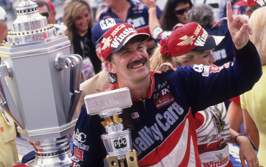 Dale Jarrett with PPG trophy after winning 1996 Brickyard 500 at Indianapolis Motor Speedway