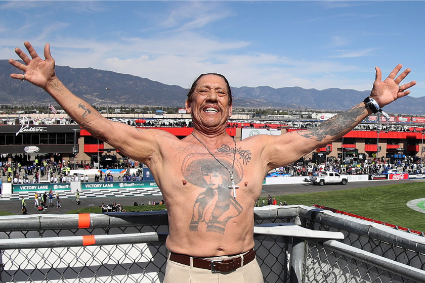 Honorary starter, actor Danny Trejo poses in the flagstand prior to the NASCAR Cup Series Wise Power 400 at Auto Club Speedway on February 27, 2022 in Fontana, California