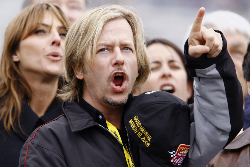 Actor and Golden Corral 500 Grand Marshal David Spade reacts to the flyby during the National Anthem before the Golden Corral 500 at the Atlanta Motor Speedway in Hampton, Georgia, March 19, 2006
