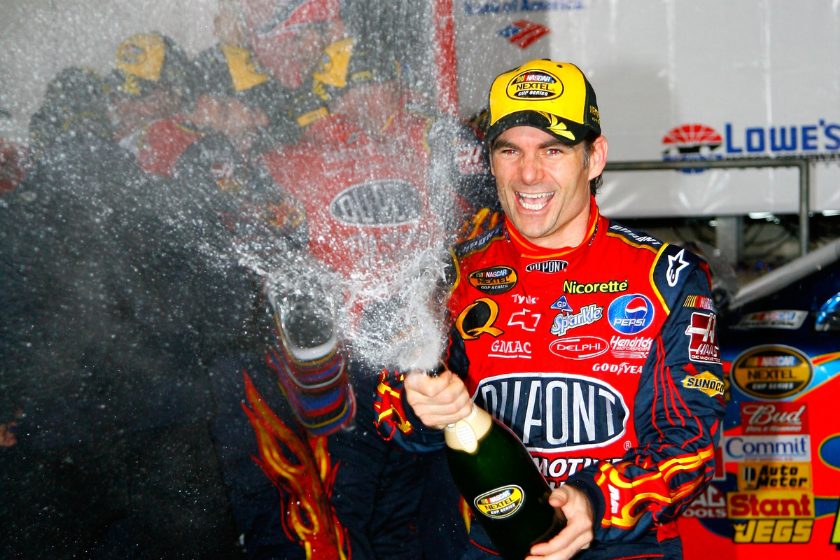 Jeff Gordon celebrates in victory lane after winning the NASCAR Nextel Cup Series Bank of America 500 at Lowe's Motor Speedway on October 13, 2007 in Concord, North Carolina