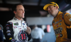 Kevin Harvick talks Kyle Busch in the garage during practice for the Monster Energy NASCAR Cup Series 1000Bulbs.com 500 at Talladega Superspeedway on October 13, 2018 in Talladega, Alabama
