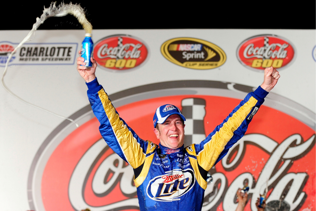 Kurt Busch celebrates in Victory Lane after winning the NASCAR Sprint Cup Series Coca-Cola 600 at Charlotte Motor Speedway on May 30, 2010 in Concord, North Carolina