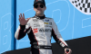 Ryan Blaney waves to fans as he walks onstage during driver intros prior to the NASCAR Cup Series Wise Power 400 at Auto Club Speedway on February 27, 2022 in Fontana, California