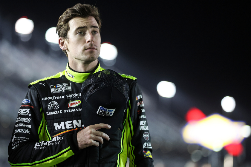 Ryan Blaney looks on during the National Anthem before qualifying for the NASCAR Cup Series 64th Annual Daytona 500 at Daytona International Speedway on February 16, 2022 in Daytona Beach, Florida