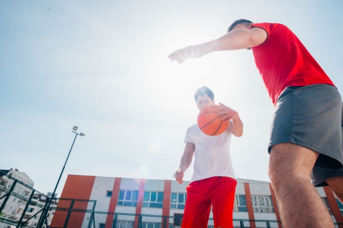 men playing basketball in basketball shorts