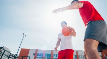 men playing basketball in basketball shorts