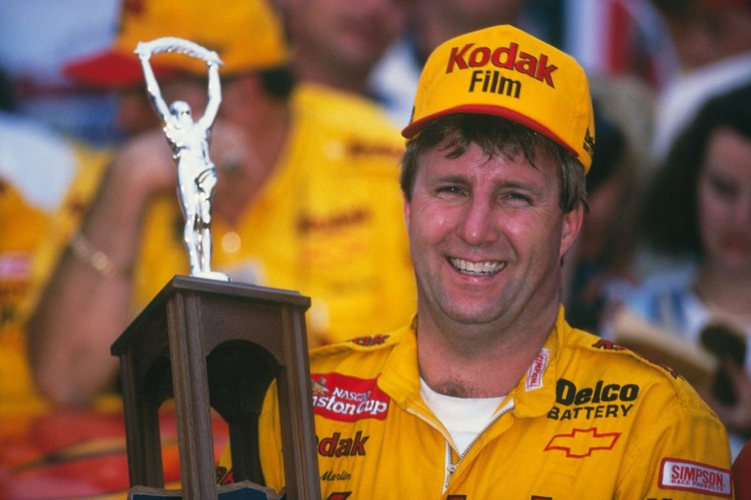 Sterling Marlin holds up his trophy after winning the Daytona 500 at the Daytona Speedway on February 19, 1995 in Daytona Beach, Florida