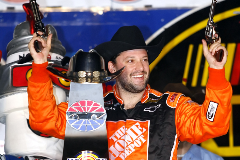 Tony Stewart celebrates winning the Dickies 500 at Texas Motor Speedway in Fort Worth, Texas on Sunday, November 5, 2006