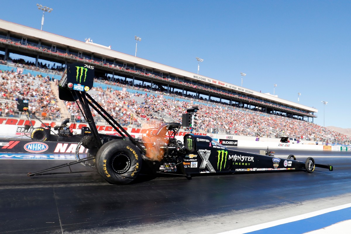 Brittany Force Monster Energy NHRA Top Fuel Dragster races down the track during the Dodge//SRT NHRA Nationals presented by Pennzoil NHRA Camping World Drag Racing Series event on October 31, 2021 at The Strip at Las Vegas Motor Speedway in Las Vegas, Nevada