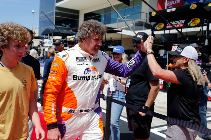 Boris Said high fives a fan during the NASCAR Cup Series - EchoPark Automotive Grand Prix on March 27, 2022 at the Circuit of the Americas in Austin, TX