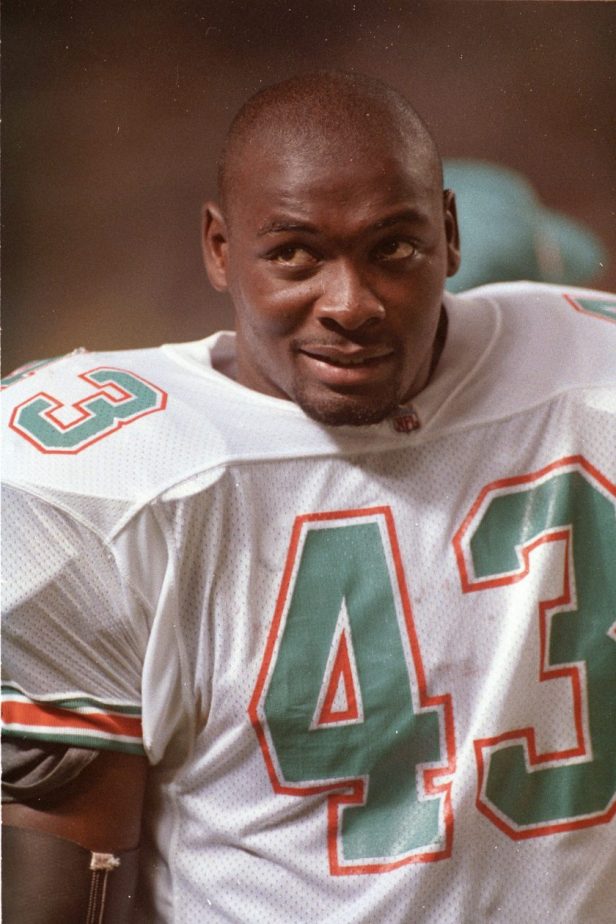 Terry Kirby looks on during a Dolphins game in 1993.