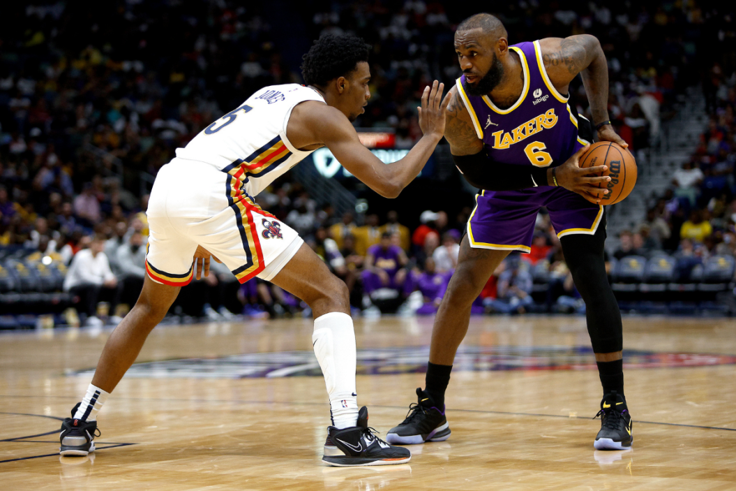 New Orleans Pelicans rookie Herbert Jones guards LeBron James of the Los Angeles Lakers.
