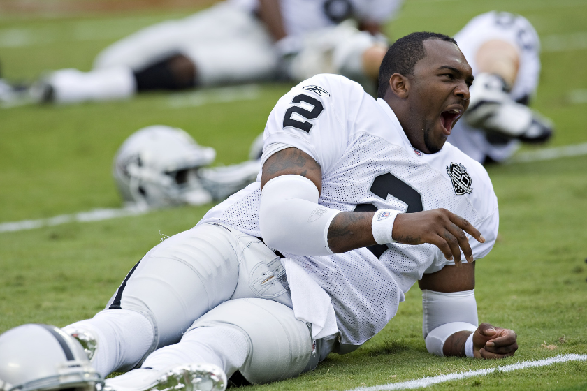 Jamarcus Russell yawns during Raiders camp.