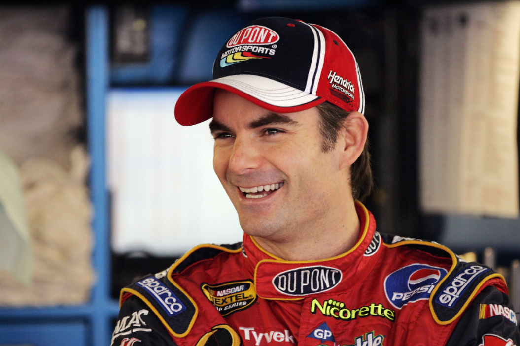 Jeff Gordon, driver of the #24 DuPont Chevrolet, looks on in the garag, during practice for the NASCAR Nextel Cup Series Banquet 400 on September 30 at Kansas Speedway in Kansas City, Kansas