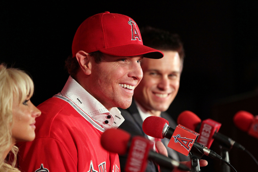 osh Hamilton #32 of the Los Angeles Angels of Anaheim smiles during the press conference introducing Hamilton as the team's newest player as Angels General Manager Jerry Dipoto