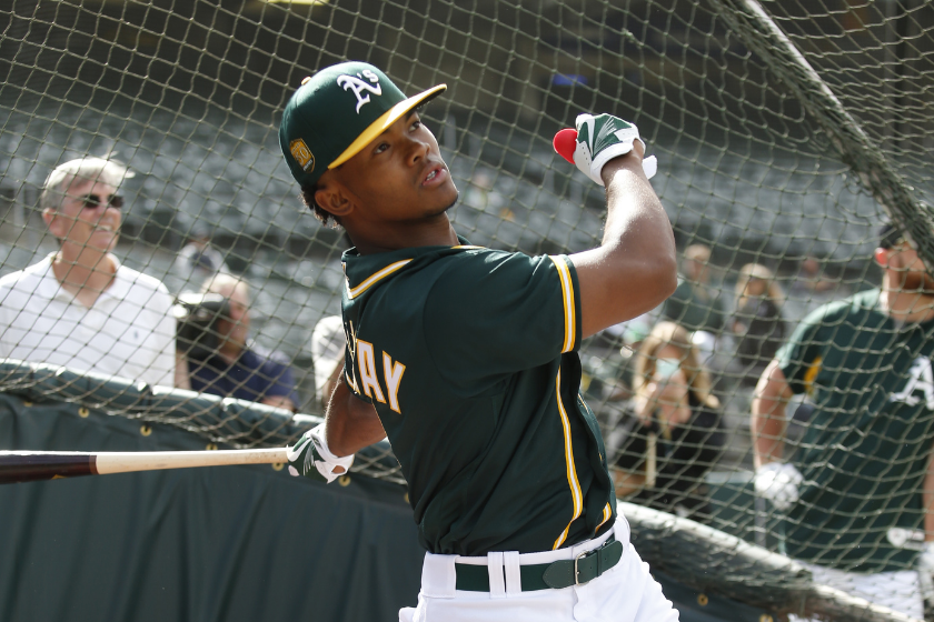 Kyler Murray takes batting practice with the Oakland Athletics