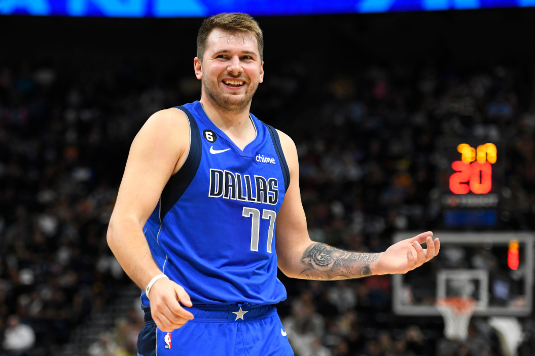 Luka Doncic reacts to a play against the Utah Jazz in a preseason game.