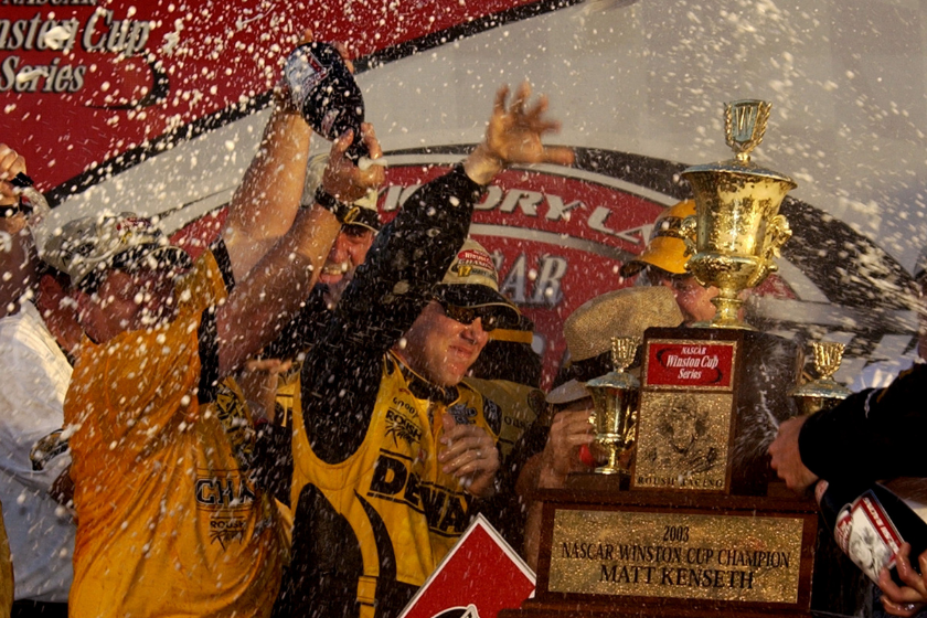 Matt Kenseth celebrates his season-ending points championship in a bath of champaign Sunday, November 16, 2003 at the Winston Cup Ford 400 at Homestead-Miami Speedway