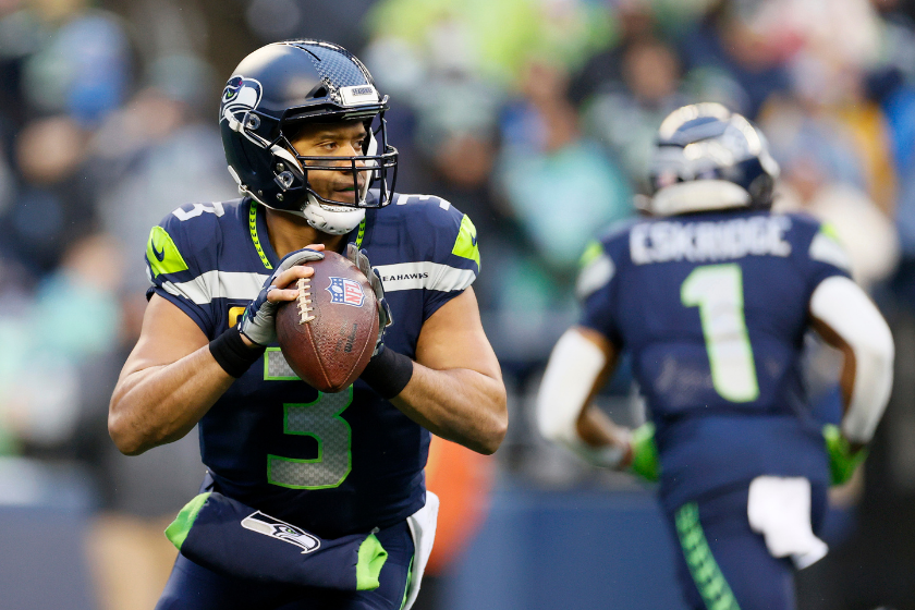 Russell Wilson drops back to pass against the Detroit Lions.