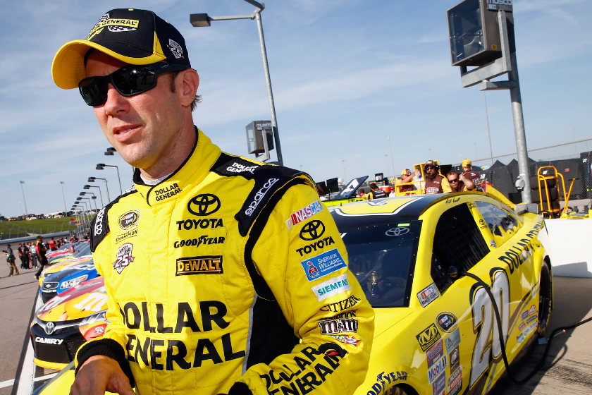 Matt Kenseth stands on the grid during qualifying for the NASCAR Sprint Cup Series Go Bowling 400 at Kansas Speedway on May 6, 2016 in Kansas City, Kansas