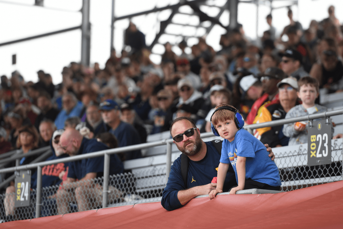 Fans look on during the qualifications for the NTT IndyCar Series Indianapolis 500 presented by Gainbridge on May 22, 2022, at the Indianapolis Motor Speedway in Indianapolis, Indiana